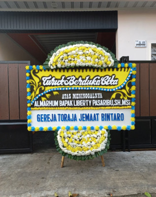 Papan Bunga Duka di Sukamaju Kaler